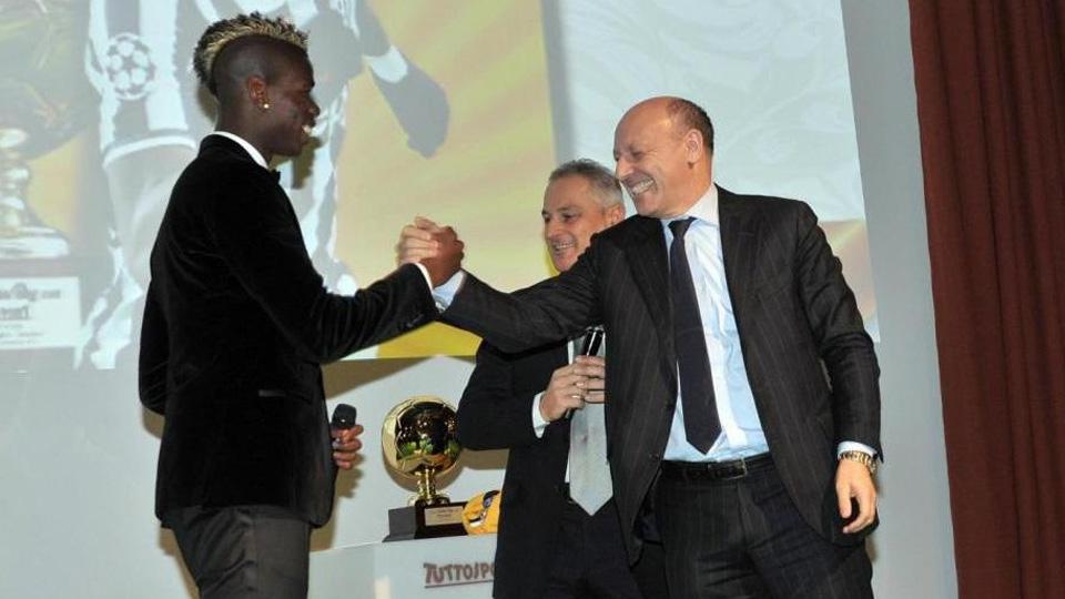 Paul Pogba dan Giuseppe Marotta (kanan). - INDOSPORT